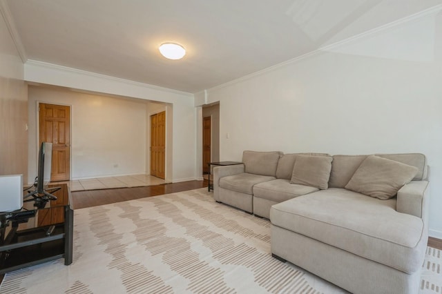18-50 211th St Unit 2D, Bayside, NY 11360 - living room featuring wood finished floors, ornamental molding, and baseboards