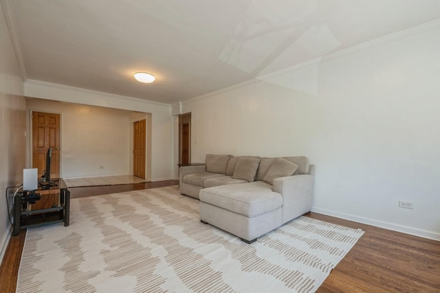 18-50 211th St Unit 2D, Bayside, NY 11360 - living room featuring crown molding, wood finished floors, and baseboards