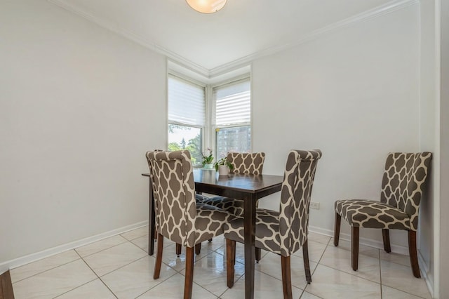 18-50 211th St Unit 2D, Bayside, NY 11360 - dining room with ornamental molding, baseboards, and light tile patterned floors