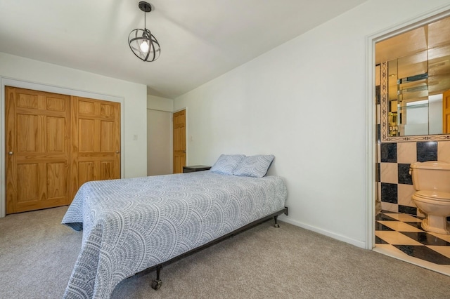 18-50 211th St Unit 2D, Bayside, NY 11360 - carpeted bedroom with baseboards and a closet