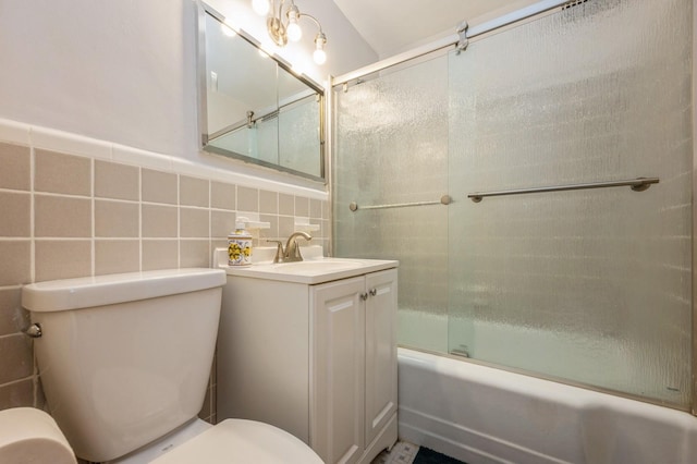 18-50 211th St Unit 2D, Bayside, NY 11360 - full bath with toilet, tile walls, enclosed tub / shower combo, vanity, and backsplash
