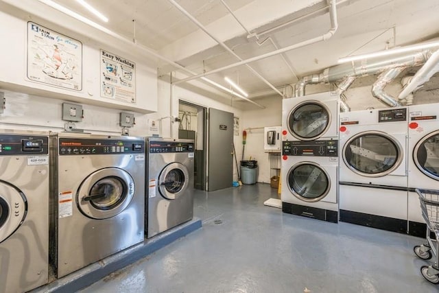 18-50 211th St Unit 2D, Bayside, NY 11360 - shared laundry room featuring stacked washer / dryer and washing machine and clothes dryer