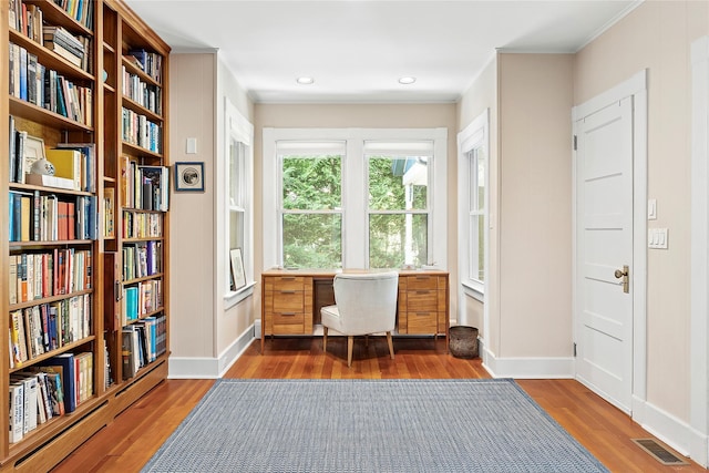 910 New Suffolk Ave, Mattituck, NY 11952 - office area with wood finished floors, baseboards, recessed lighting, and crown molding