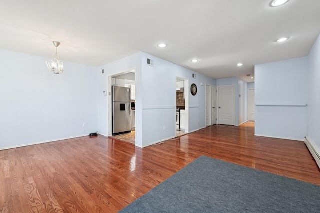 200-15 16th Ave, Bayside, NY 11360 - empty room with a chandelier, wood finished floors, baseboards, and recessed lighting