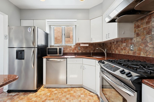 200-15 16th Ave, Bayside, NY 11360 - kitchen with stainless steel appliances, extractor fan, a sink, dark countertops, and white cabinets
