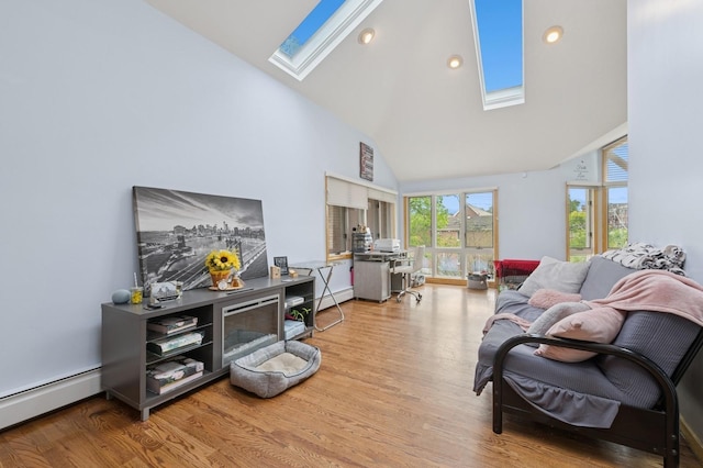 200-15 16th Ave, Bayside, NY 11360 - living area with a skylight, high vaulted ceiling, baseboard heating, wood finished floors, and recessed lighting