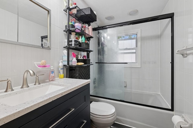 200-15 16th Ave, Bayside, NY 11360 - bathroom featuring vanity, combined bath / shower with glass door, and toilet