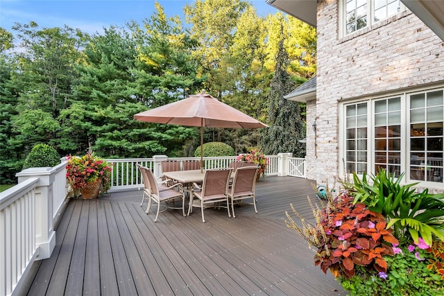 4 Pond Ln, Sands Point, NY 11050 - deck featuring outdoor dining space and view of scattered trees