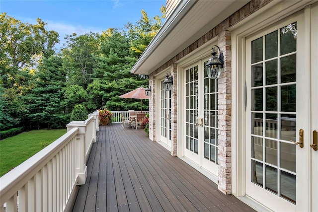 4 Pond Ln, Sands Point, NY 11050 - deck featuring french doors, outdoor dining space, and a yard