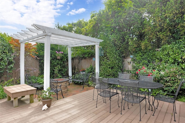 26 Adams Ave, Bayville, NY 11709 - wooden terrace with a pergola, outdoor dining area, and an outdoor fire pit