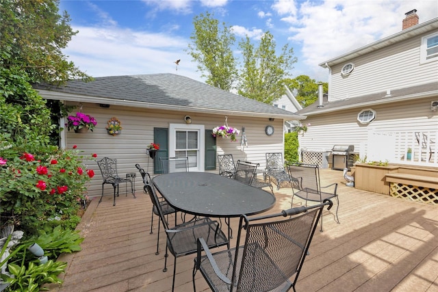 26 Adams Ave, Bayville, NY 11709 - wooden deck featuring outdoor dining space and a grill