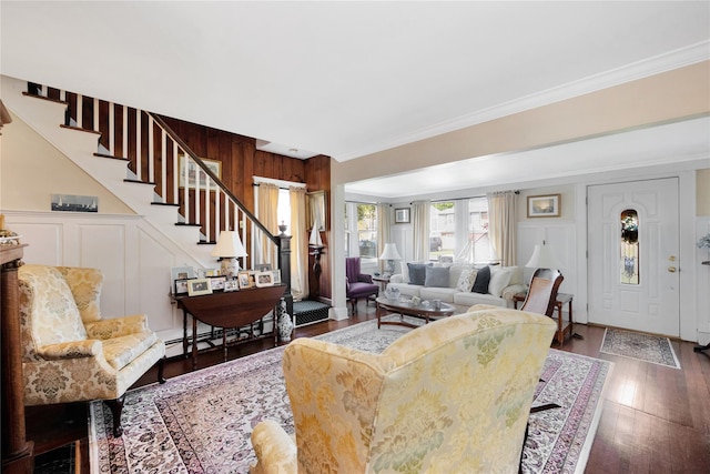 26 Adams Ave, Bayville, NY 11709 - living room featuring stairs, ornamental molding, wood finished floors, and a decorative wall