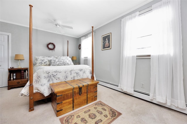 26 Adams Ave, Bayville, NY 11709 - carpeted bedroom with ornamental molding, a baseboard radiator, and a ceiling fan