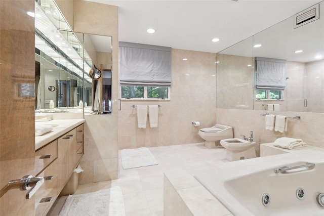 1 Polly Pk Rd, Rye, NY 10580 - full bathroom featuring tile walls, toilet, a bidet, a whirlpool tub, and vanity