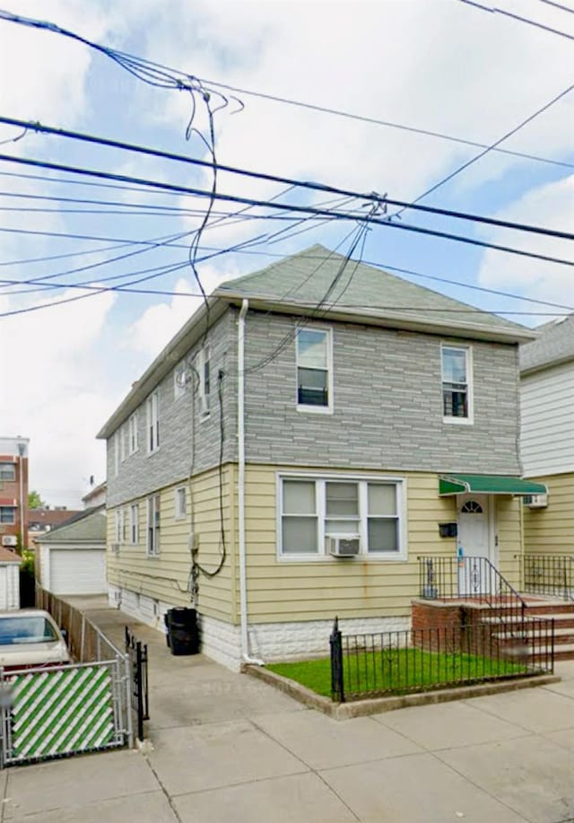 45-18 164th St, Flushing, NY 11358 - view of front of property with a fenced front yard and a gate