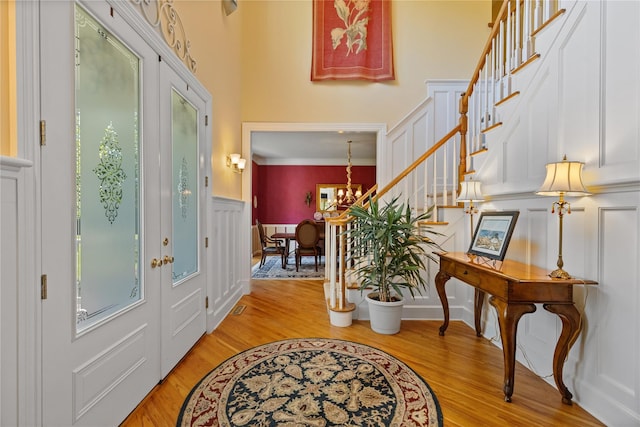 1 Majestic Rdg, Carmel, NY 10512 - foyer with stairs, light wood finished floors, and a chandelier