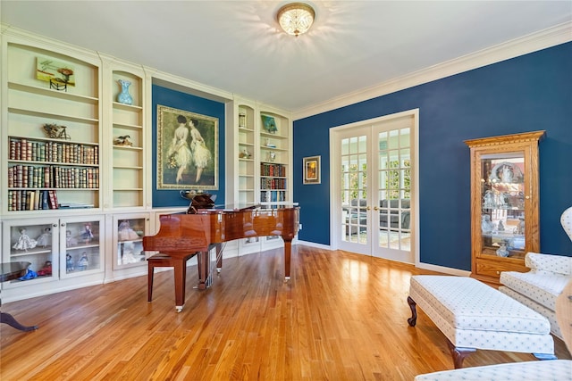 1 Majestic Rdg, Carmel, NY 10512 - sitting room with french doors, wood finished floors, built in shelves, ornamental molding, and baseboards
