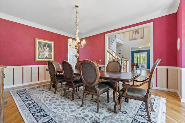 1 Majestic Rdg, Carmel, NY 10512 - dining room featuring a chandelier, a wainscoted wall, light wood finished floors, crown molding, and stairway