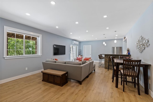1 Majestic Rdg, Carmel, NY 10512 - living room with a wall mounted AC, light wood-type flooring, recessed lighting, and baseboards