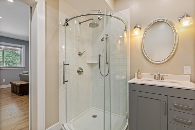 1 Majestic Rdg, Carmel, NY 10512 - full bathroom with a stall shower, vanity, wood finished floors, and baseboards