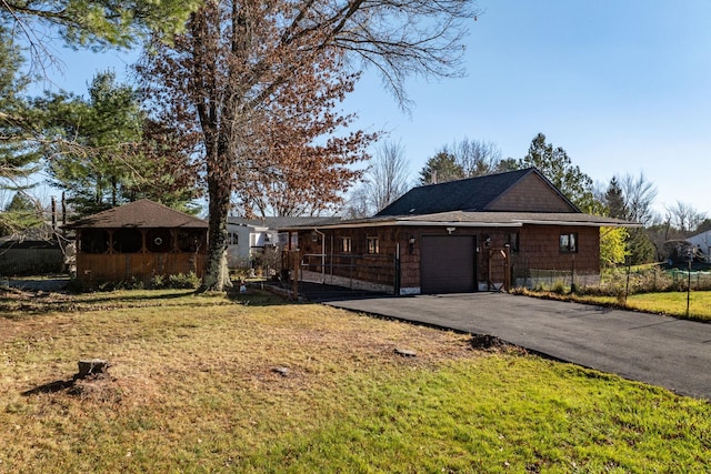 6 Medallion Rd, Kiamesha Lake, NY 12751 - view of front facade featuring an attached garage and driveway