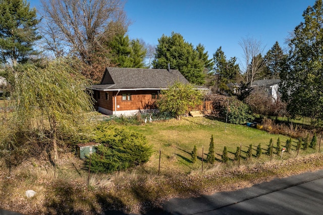6 Medallion Rd, Kiamesha Lake, NY 12751 - view of property exterior featuring roof with shingles