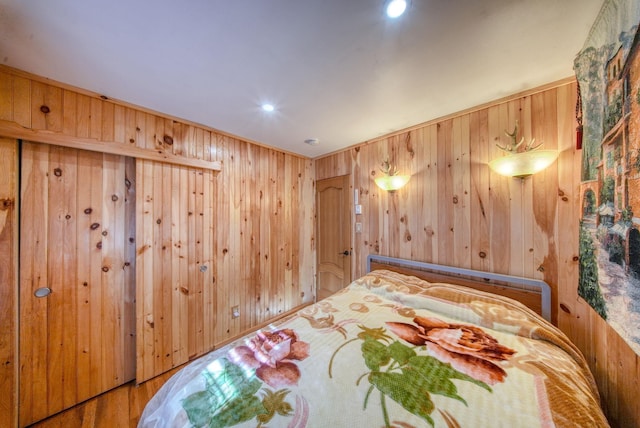 6 Medallion Rd, Kiamesha Lake, NY 12751 - bedroom featuring wooden walls, recessed lighting, and wood finished floors