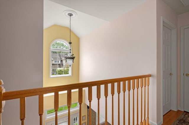 5 Mantack Path, Kings Park, NY 11754 - hall featuring wood finished floors, vaulted ceiling, and baseboards