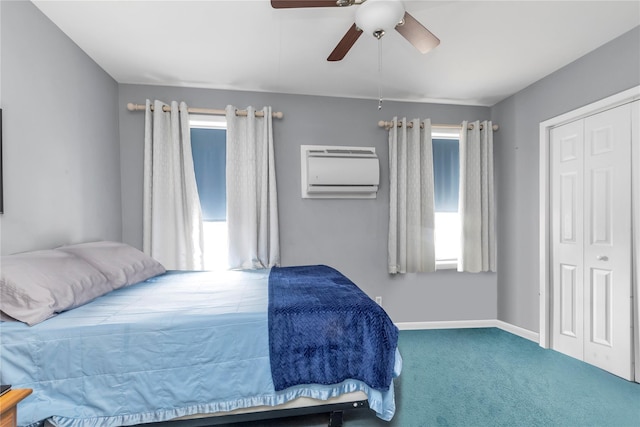 149-32 18th Ave, Whitestone, NY 11357 - bedroom with a wall mounted air conditioner, carpet floors, baseboards, a closet, and a ceiling fan