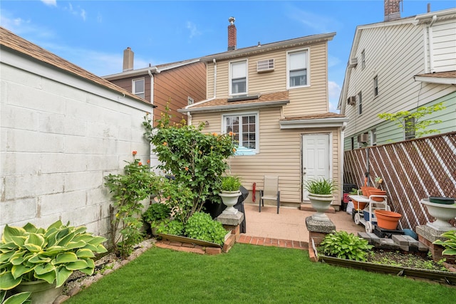 149-32 18th Ave, Whitestone, NY 11357 - rear view of house with a patio area