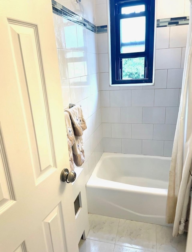 57-21 246th Cres Unit 1Fl, Douglaston, NY 11362 - bathroom with shower / tub combo with curtain and marble finish floors