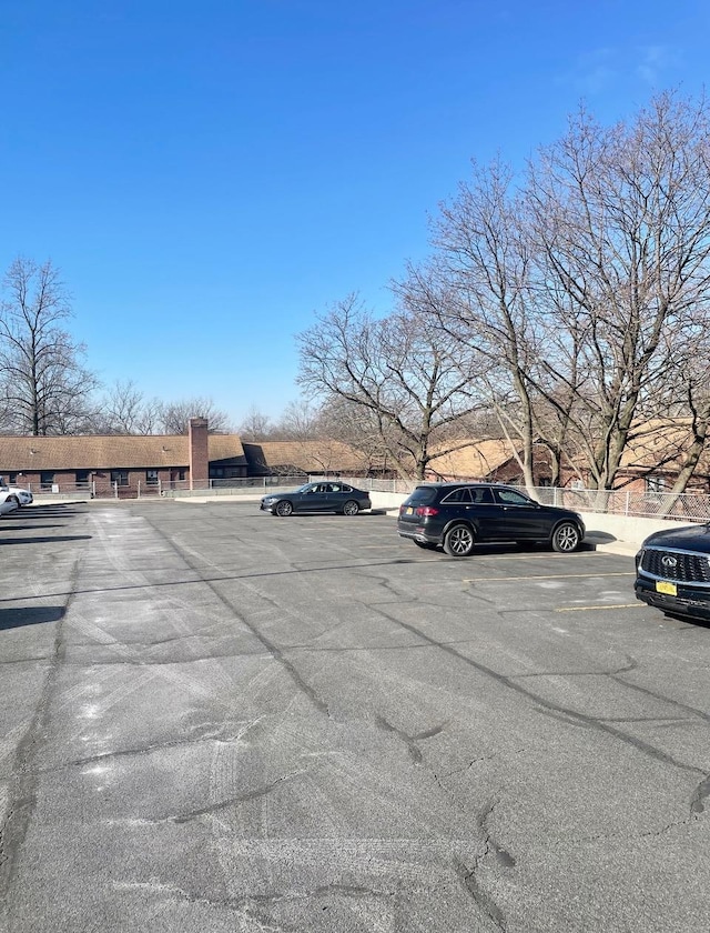 57-21 246th Cres Unit 1Fl, Douglaston, NY 11362 - view of uncovered parking lot