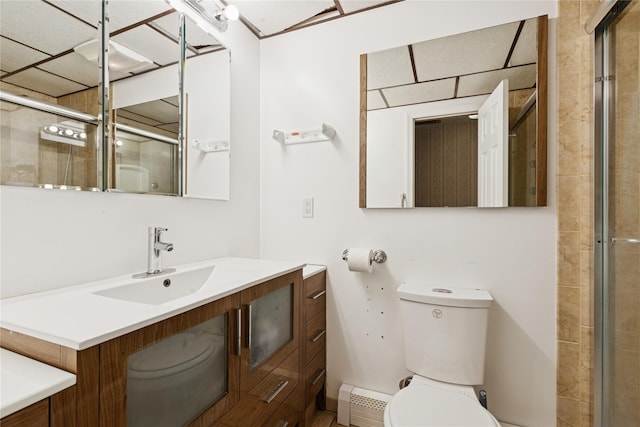 26 Beach Ave, Port Jefferson Station, NY 11776 - full bath with a baseboard radiator, vanity, toilet, and a tile shower