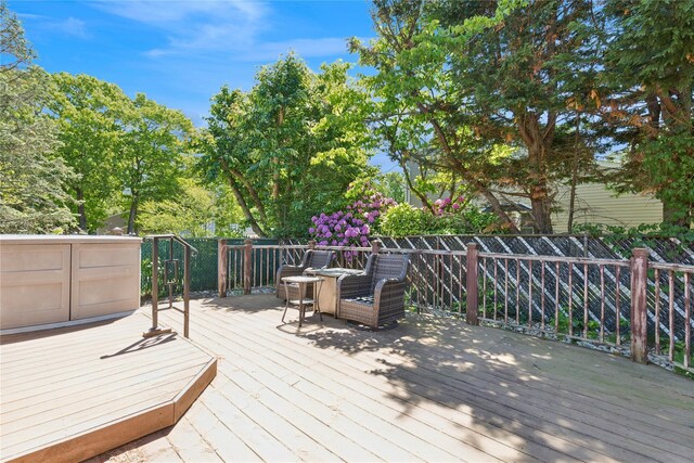 26 Beach Ave, Port Jefferson Station, NY 11776 - wooden deck featuring a shed