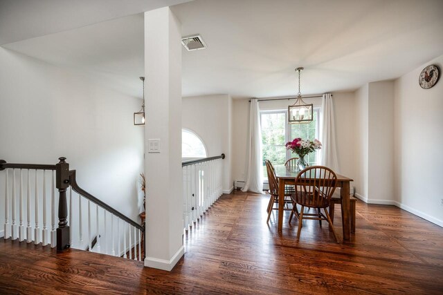 5692 Rte 82, Clinton Corners, NY 12514 - dining room with a chandelier, wood finished floors, baseboards, and baseboard heating