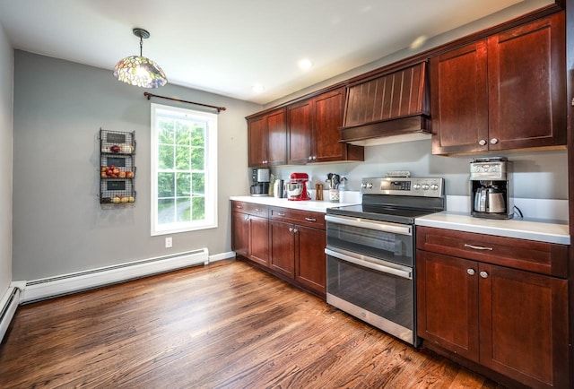 5692 Rte 82, Clinton Corners, NY 12514 - kitchen featuring range with two ovens, wood finished floors, light countertops, a baseboard radiator, and recessed lighting