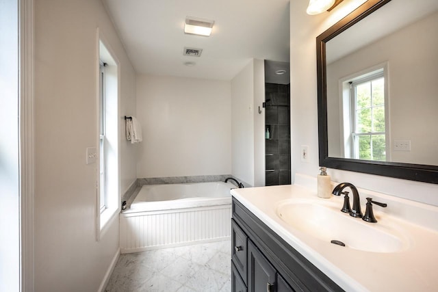 5692 Rte 82, Clinton Corners, NY 12514 - full bathroom featuring vanity, a bath, and baseboards