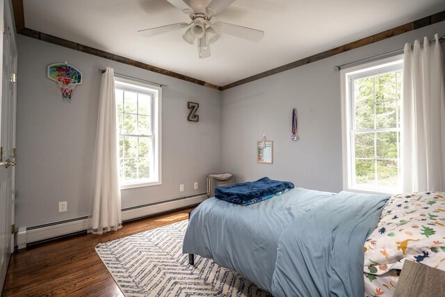 5692 Rte 82, Clinton Corners, NY 12514 - bedroom with wood finished floors, a ceiling fan, and a baseboard radiator