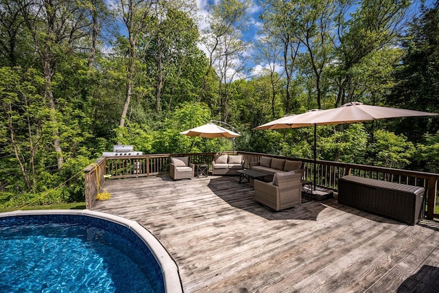 5692 Rte 82, Clinton Corners, NY 12514 - wooden deck featuring an outdoor living space and a forest view