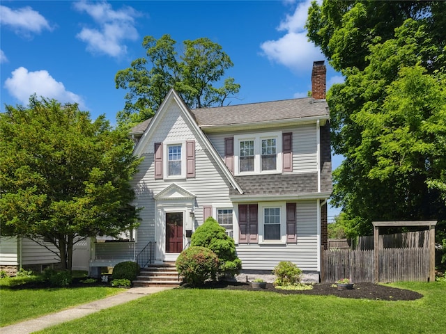 2 Mitchell Ave, Poughkeepsie, NY 12603 - view of front of home with a chimney and a shingled roof