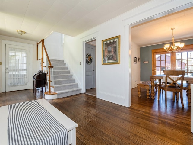 2 Mitchell Ave, Poughkeepsie, NY 12603 - entrance foyer featuring a chandelier, stairway, wood finished floors, and baseboards
