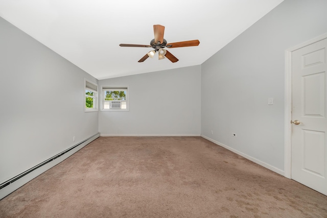 15 W Granada Ave, Lindenhurst, NY 11757 - empty room with a baseboard radiator, vaulted ceiling, ceiling fan, carpet, and baseboards