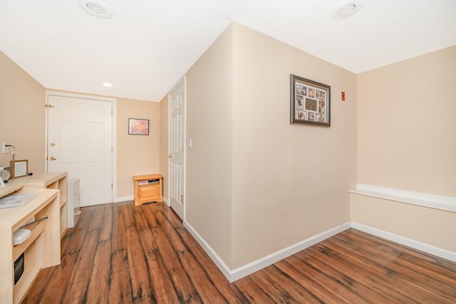 15 W Granada Ave, Lindenhurst, NY 11757 - hallway with dark wood finished floors, baseboards, and recessed lighting
