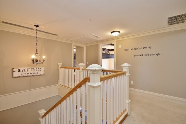 237 Hynes Rd, Poughquag, NY 12570 - hallway with an upstairs landing, a chandelier, carpet, crown molding, and baseboards
