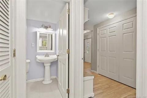 237 Hynes Rd, Poughquag, NY 12570 - bathroom featuring baseboards and wood finished floors