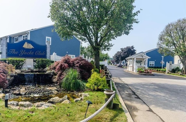 100 Baker Ct Unit 63, Island Park, NY 11558 - view of asphalt street with curbs