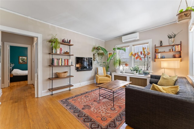 27 Luzern Rd, Dobbs Ferry, NY 10522 - living area featuring a wall mounted air conditioner, light wood-type flooring, radiator heating unit, crown molding, and baseboards