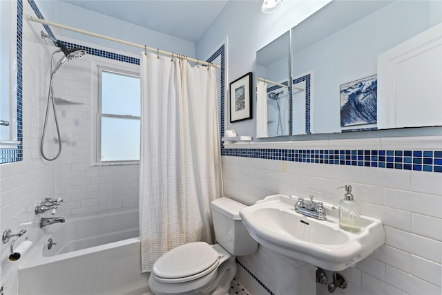 27 Luzern Rd, Dobbs Ferry, NY 10522 - bathroom featuring tile walls, toilet, shower / bathtub combination with curtain, and a sink
