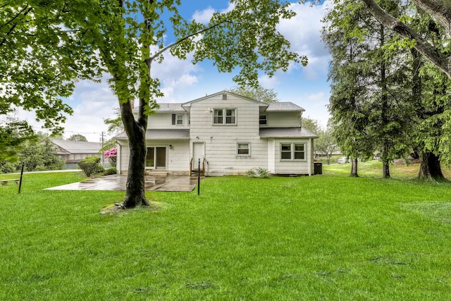 1 Lodi Ln, Monsey, NY 10952 - rear view of house with a patio area, a lawn, and a shingled roof