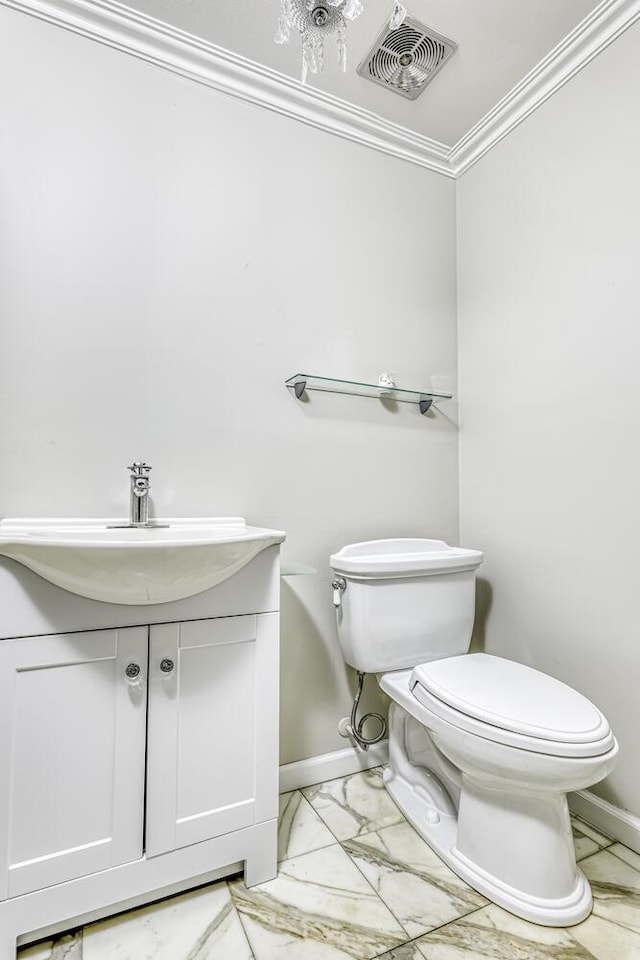 1 Lodi Ln, Monsey, NY 10952 - bathroom with toilet, vanity, marble finish flooring, baseboards, and ornamental molding